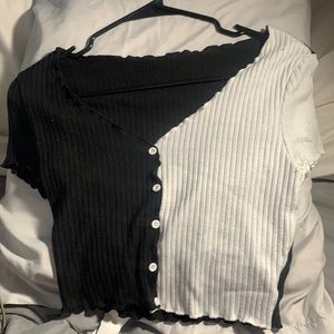 half black, half who’re, fake button up in the middle